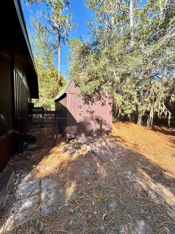 a view of a yard with an trees