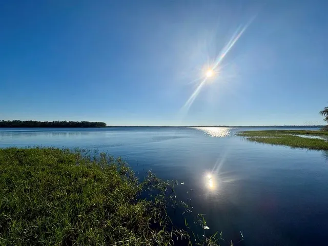 a view of lake and mountain