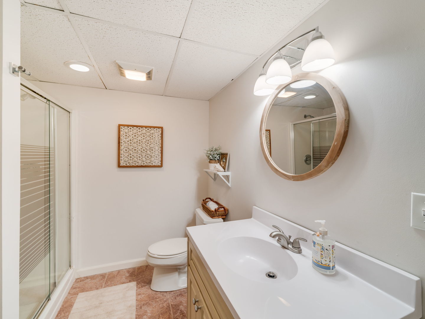 626 Buena Road Lake Forest, IL 60045 - Photo 26 of 37 a bathroom with a sink a mirror and a toilet