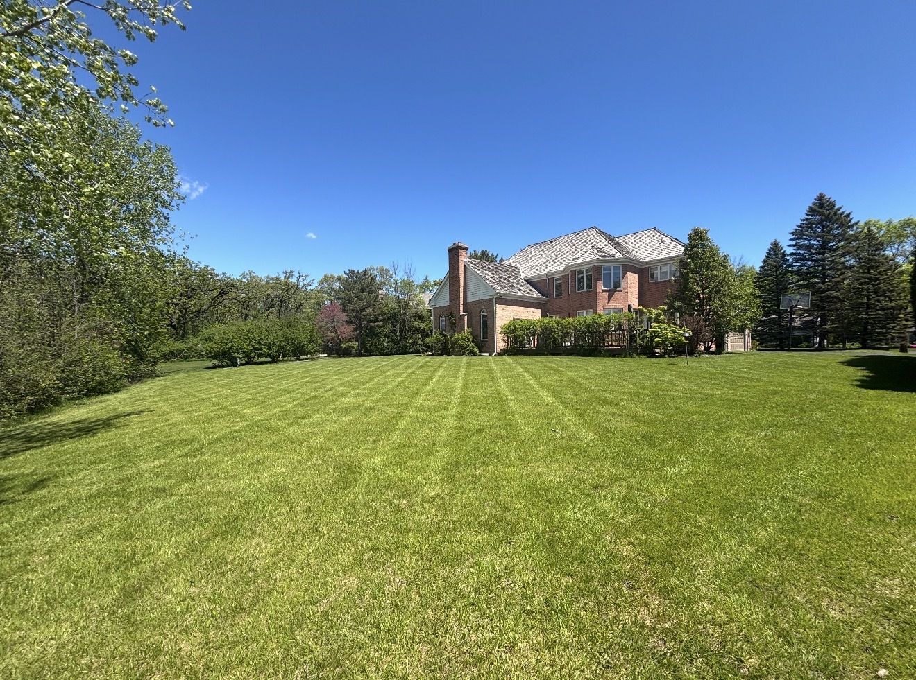 626 Buena Road Lake Forest, IL 60045 - Photo 28 of 37 a view of a garden with a building in the background