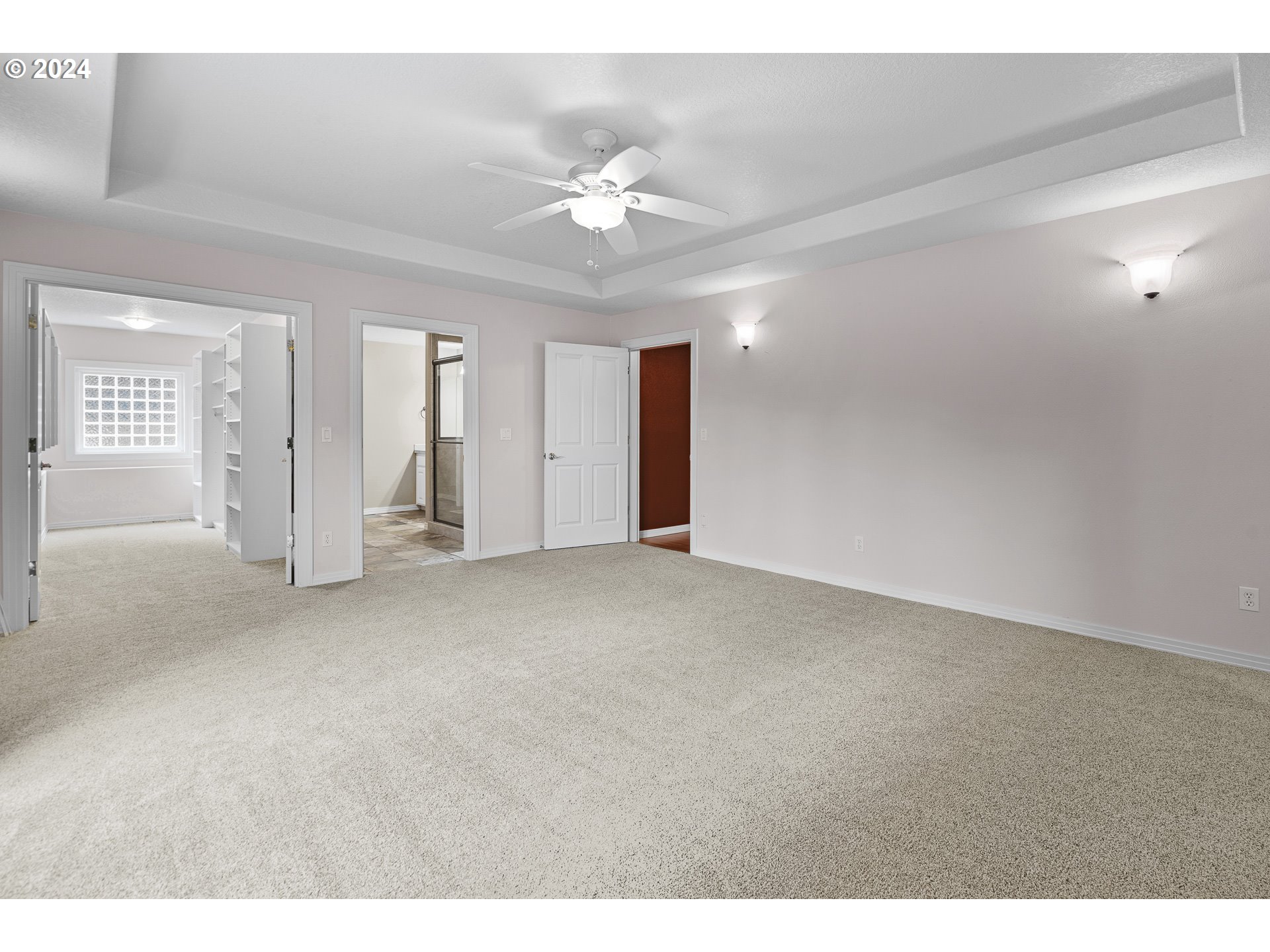 11084 Southeast Valley Way Happy Valley, OR 97086 - Photo 22 of 40 a view of an empty room with a ceiling fan