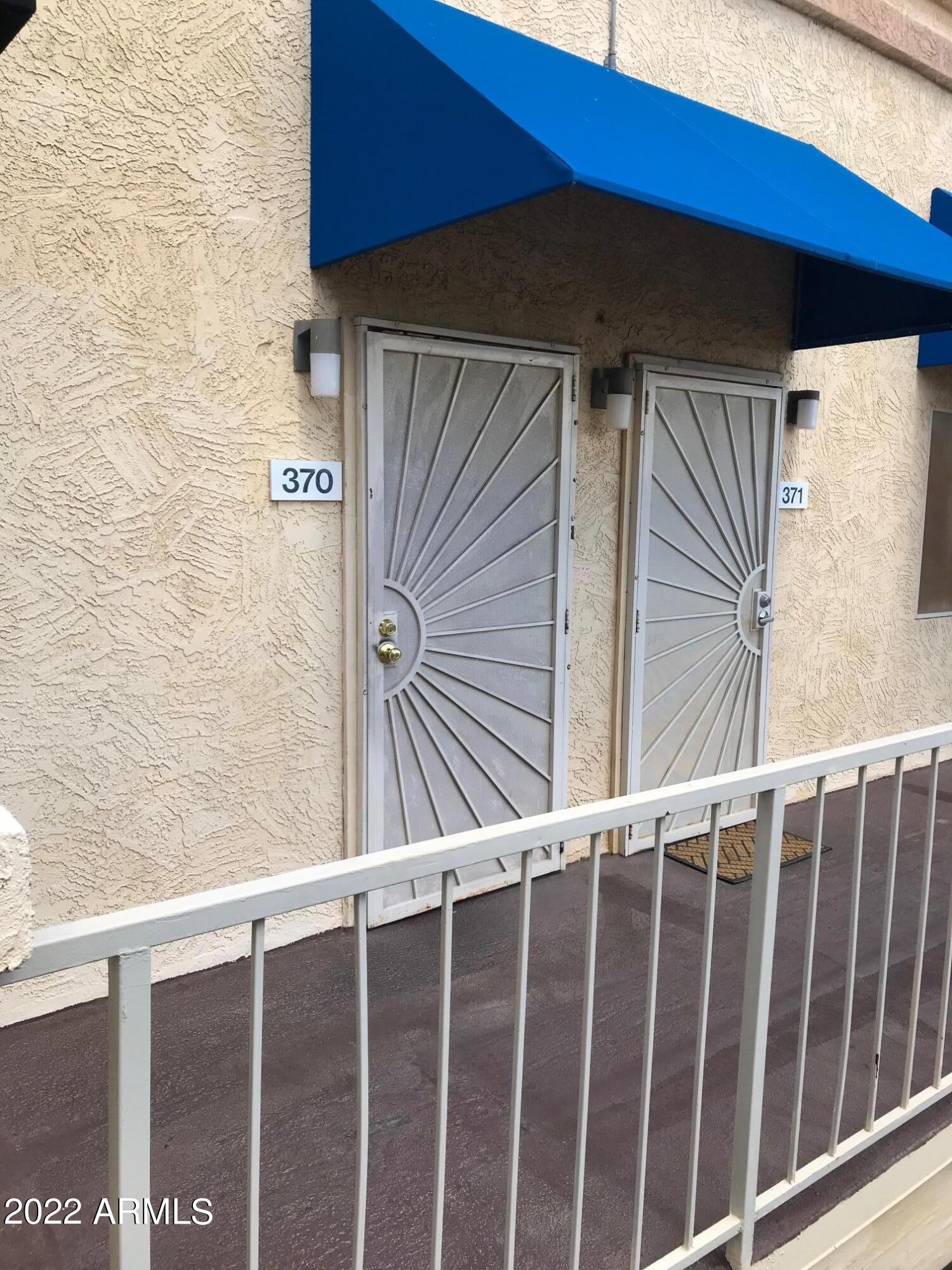 12221 West Bell Road, Unit 370 Surprise, AZ 85378 - Photo 1 of 18 FRONT DOOR WITH SCREEN