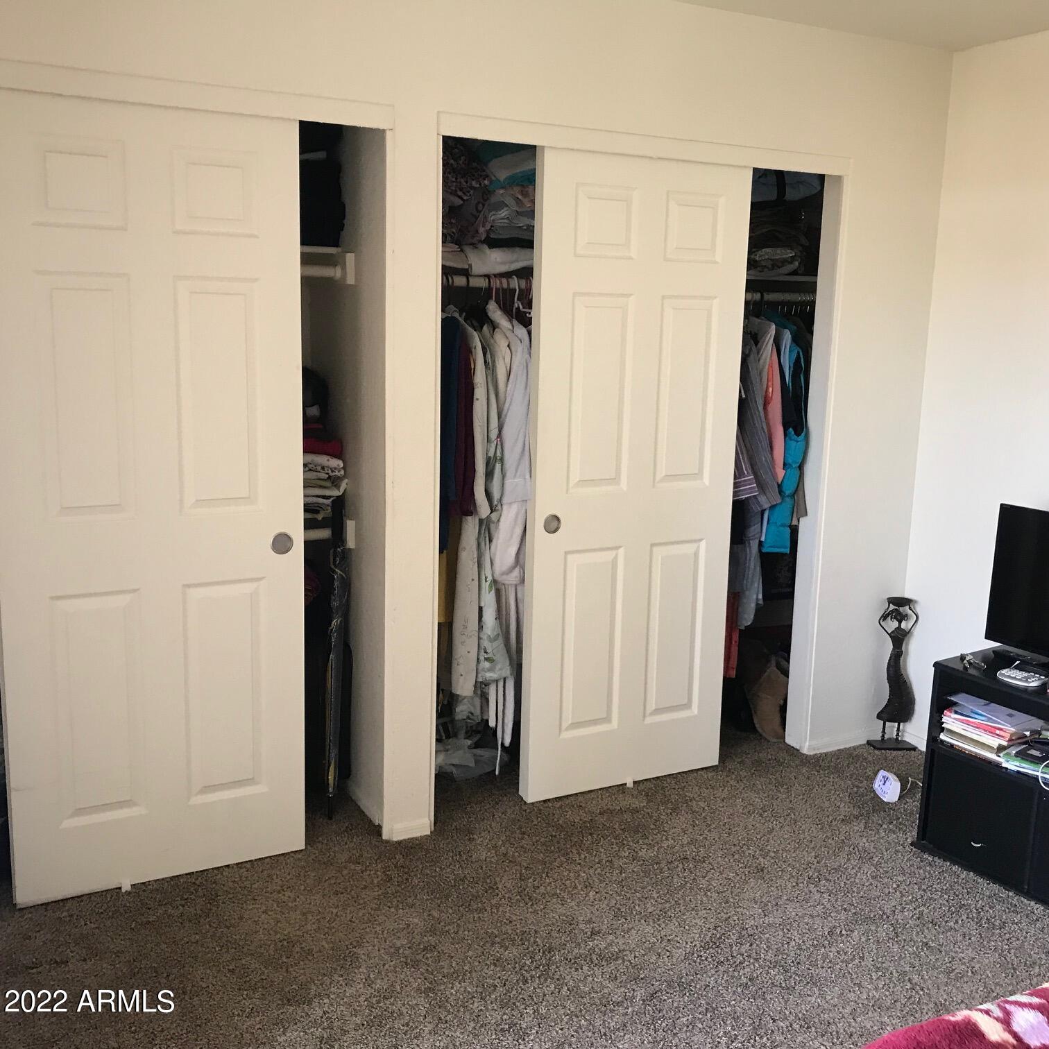 12221 West Bell Road, Unit 370 Surprise, AZ 85378 - Photo 11 of 18 a view of room with closet