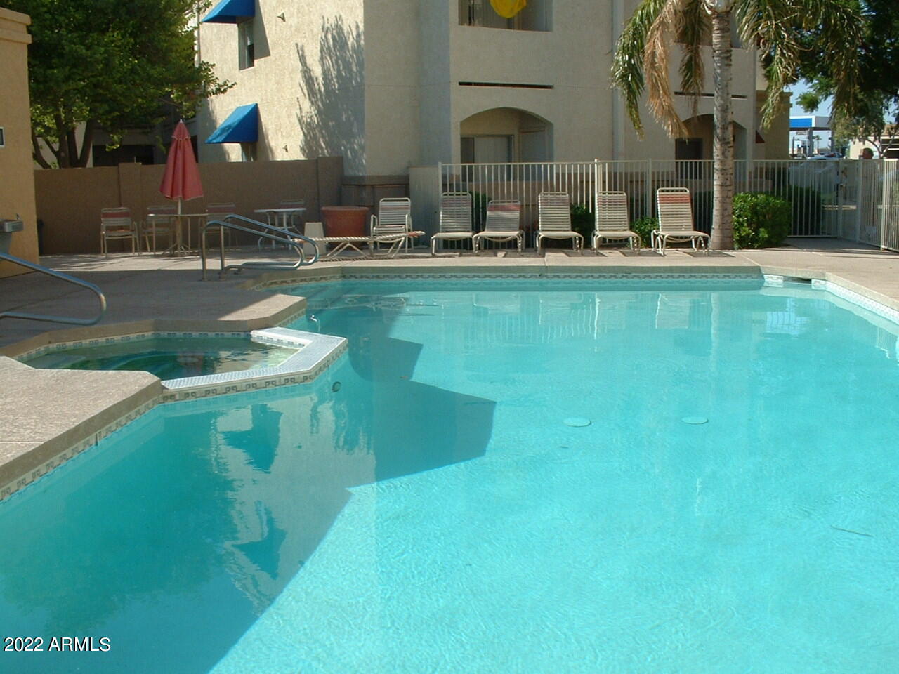 12221 West Bell Road, Unit 370 Surprise, AZ 85378 - Photo 16 of 18 a house view with swimming pool