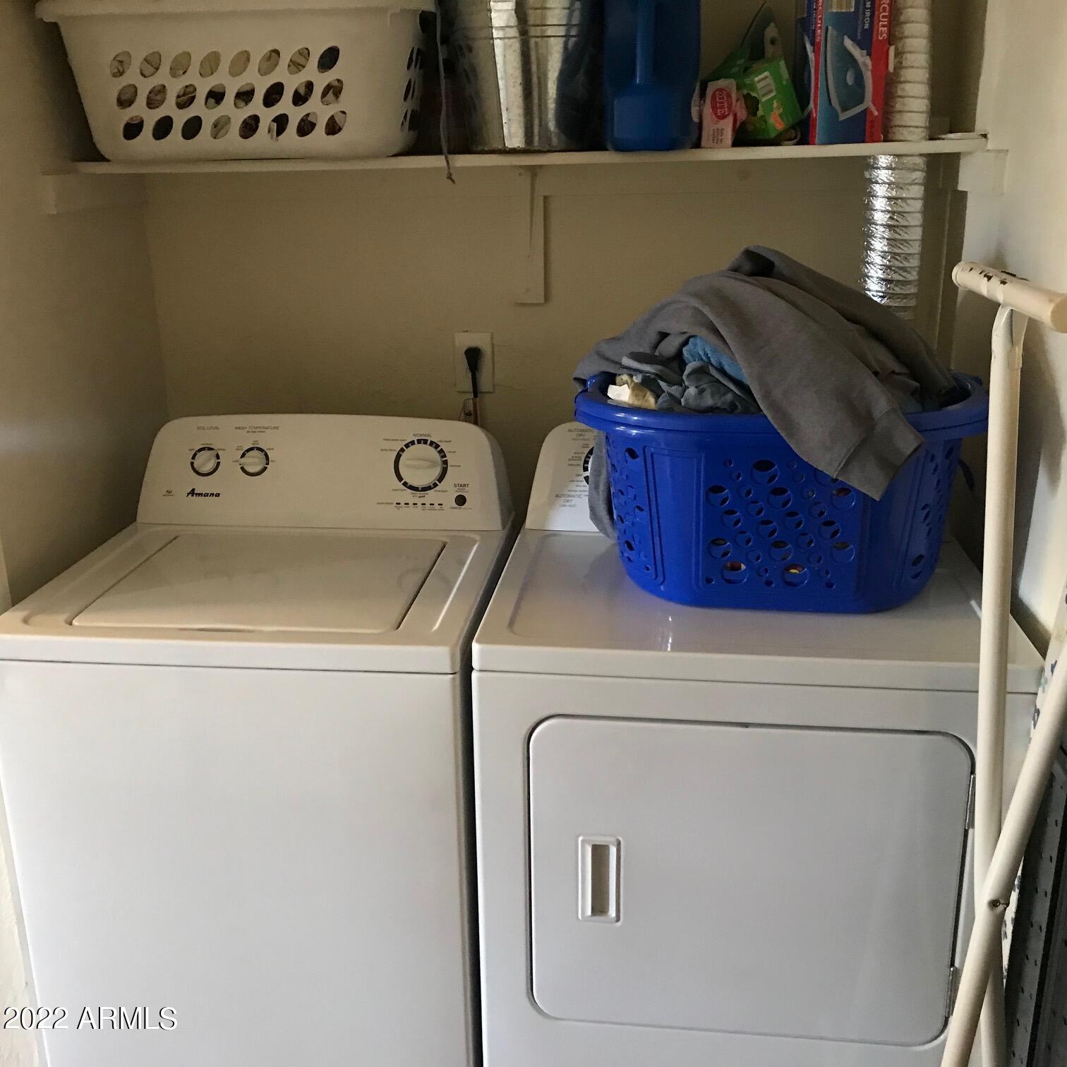 12221 West Bell Road, Unit 370 Surprise, AZ 85378 - Photo 8 of 18 a utility room with dryer and washer