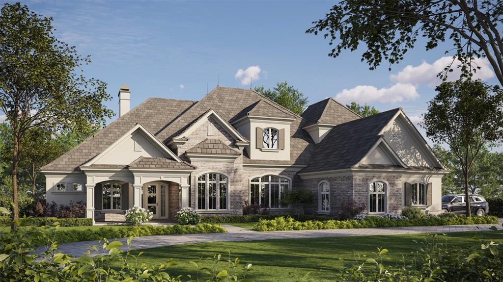 a front view of a house with a big yard and potted plants