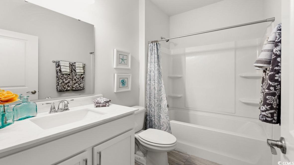 737 Doonbeg Court Conway, SC 29526 - Photo 26 of 33 Full bath featuring vanity, shower / bath combo, and toilet