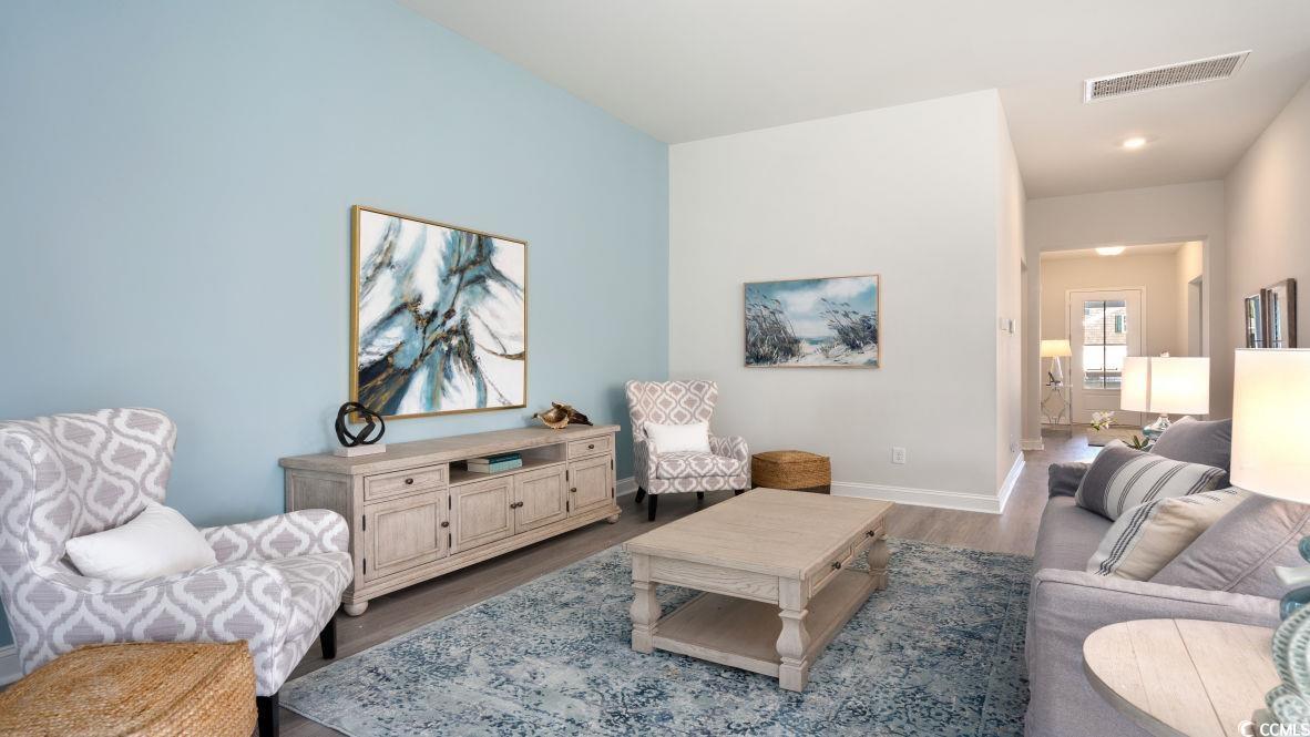737 Doonbeg Court Conway, SC 29526 - Photo 6 of 33 Living area with dark wood-style floors and baseboards