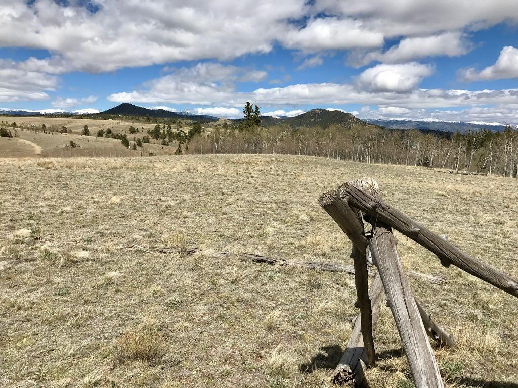 600 Pronghorn Drive Como, CO 80456 - Photo 3 of 6 a view of a lake with a mountain in the background
