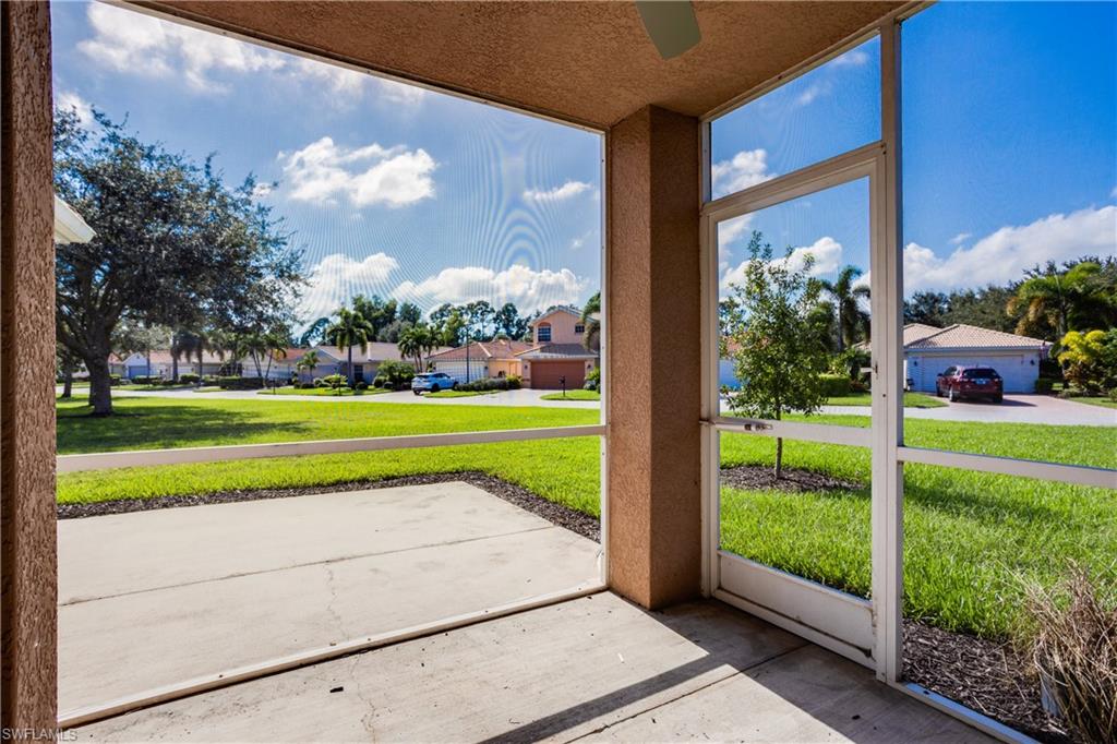 9026 Astonia Way Estero, FL 33967 - Photo 15 of 38 a view of a garden and front view