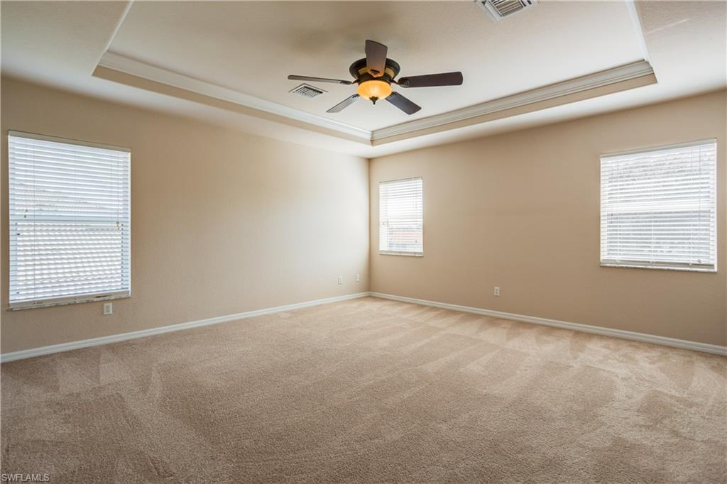 9026 Astonia Way Estero, FL 33967 - Photo 17 of 38 a view of empty room with windows