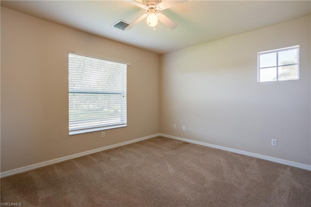 9026 Astonia Way Estero, FL 33967 - Photo 24 of 38 an empty room with a window