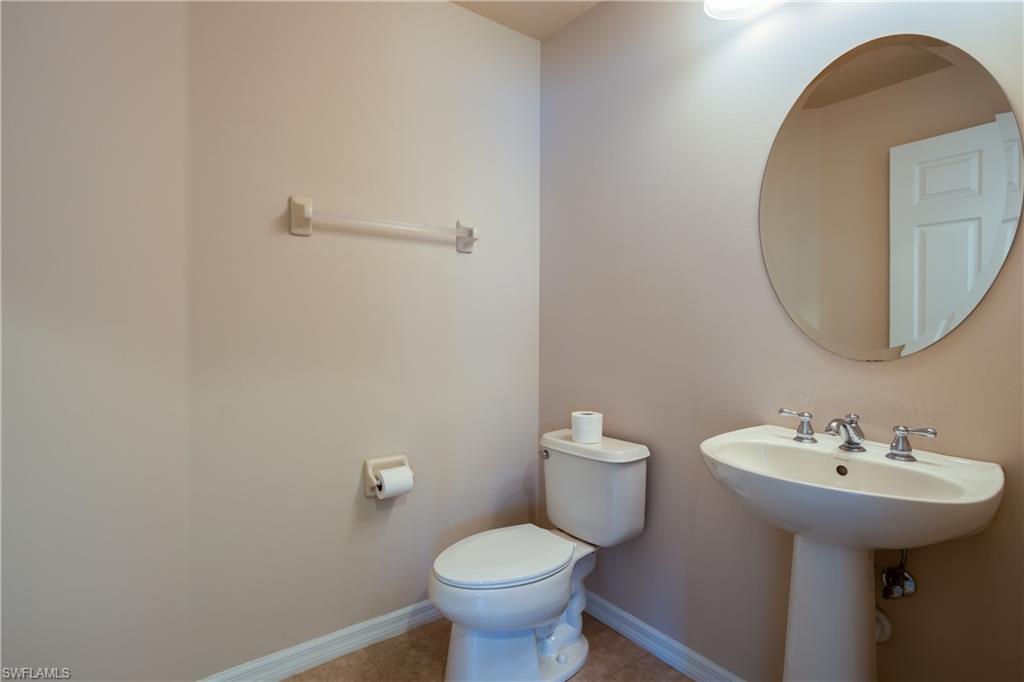 9026 Astonia Way Estero, FL 33967 - Photo 29 of 38 a bathroom with a sink and a toilet