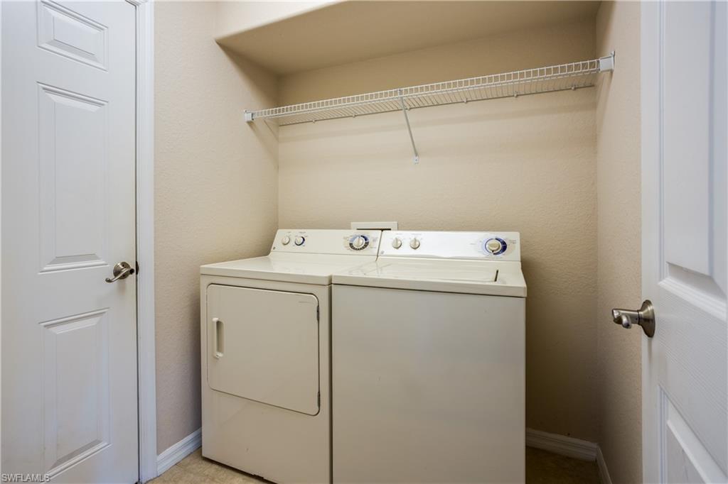 9026 Astonia Way Estero, FL 33967 - Photo 30 of 38 a utility room with dryer and washer