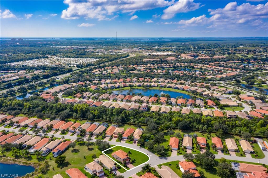 9026 Astonia Way Estero, FL 33967 - Photo 35 of 38 an aerial view of residential houses with outdoor space