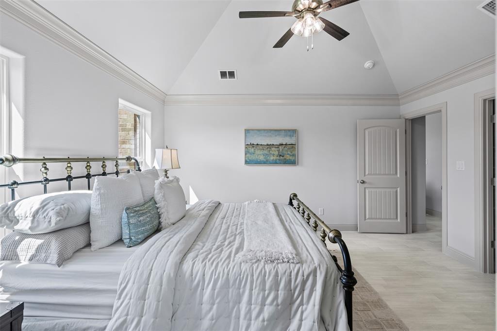 725 Jameson Springtown, TX 76082 - Photo 17 of 38 a bedroom with a bed and window