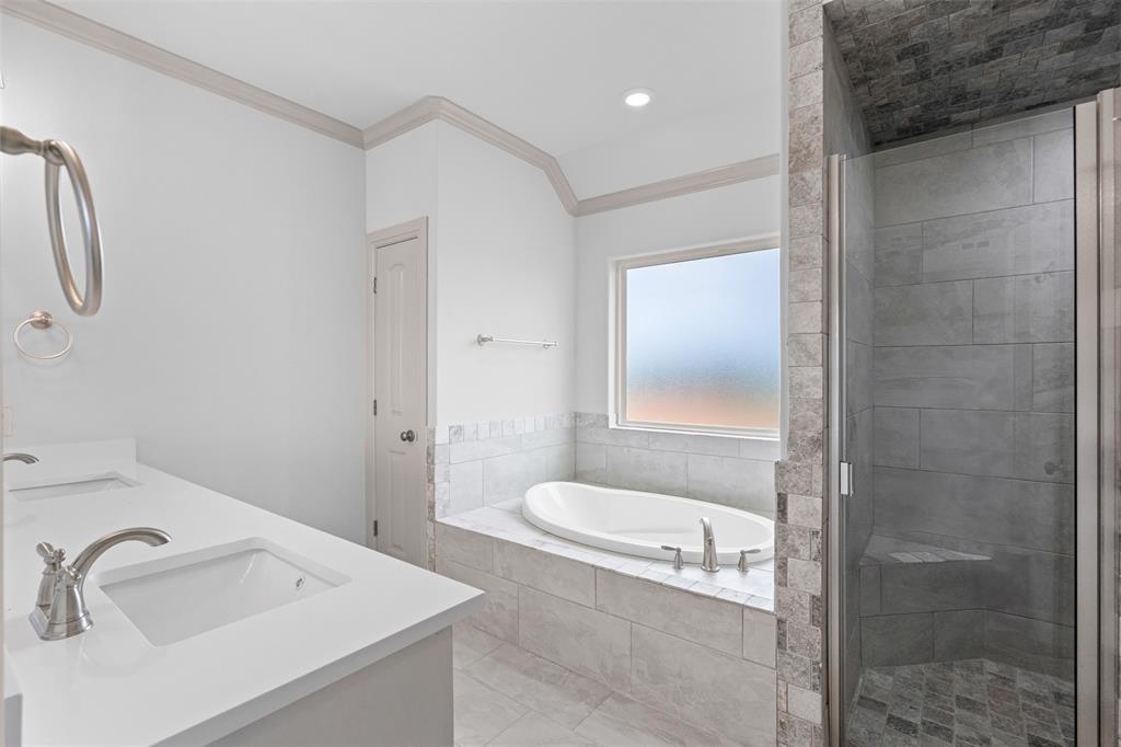 725 Jameson Springtown, TX 76082 - Photo 19 of 38 a bathroom with a sink toilet and shower