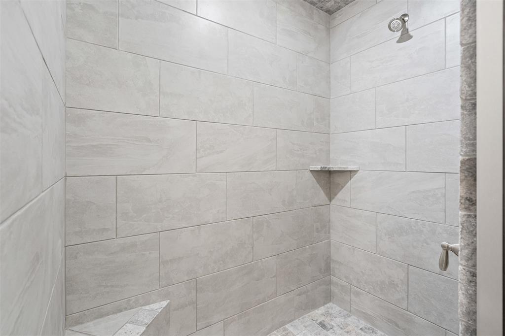 725 Jameson Springtown, TX 76082 - Photo 22 of 38 a bathroom with a shower