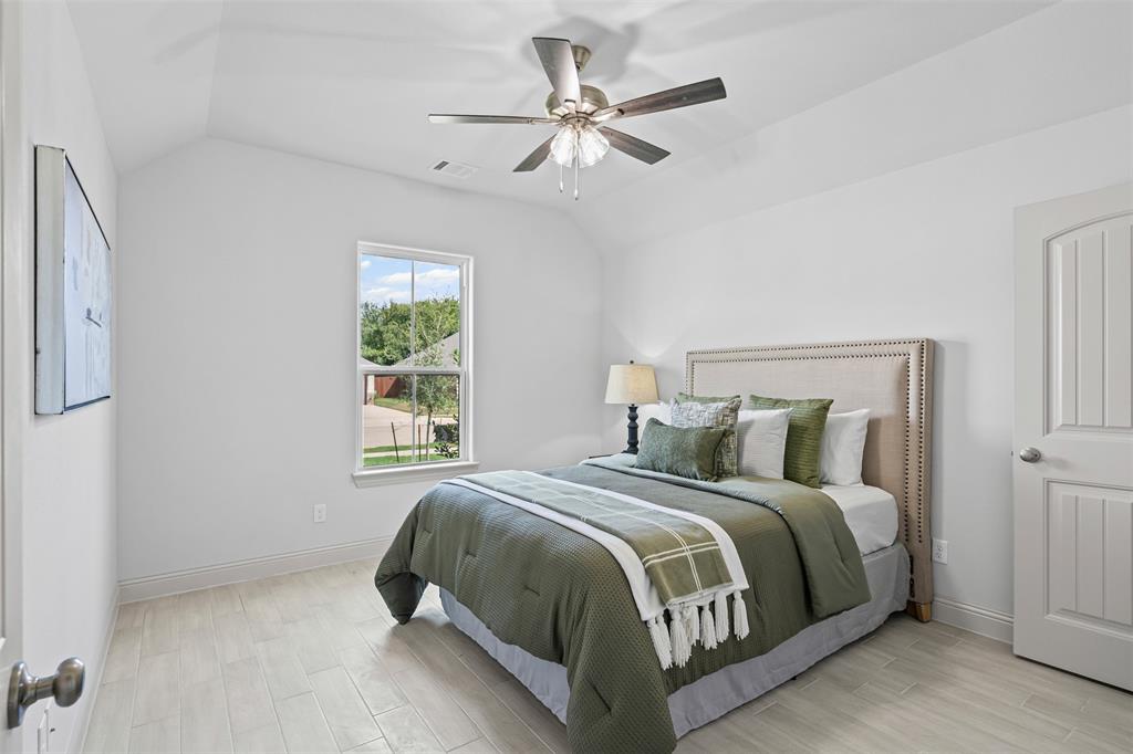 725 Jameson Springtown, TX 76082 - Photo 25 of 38 a bedroom with a bed and window