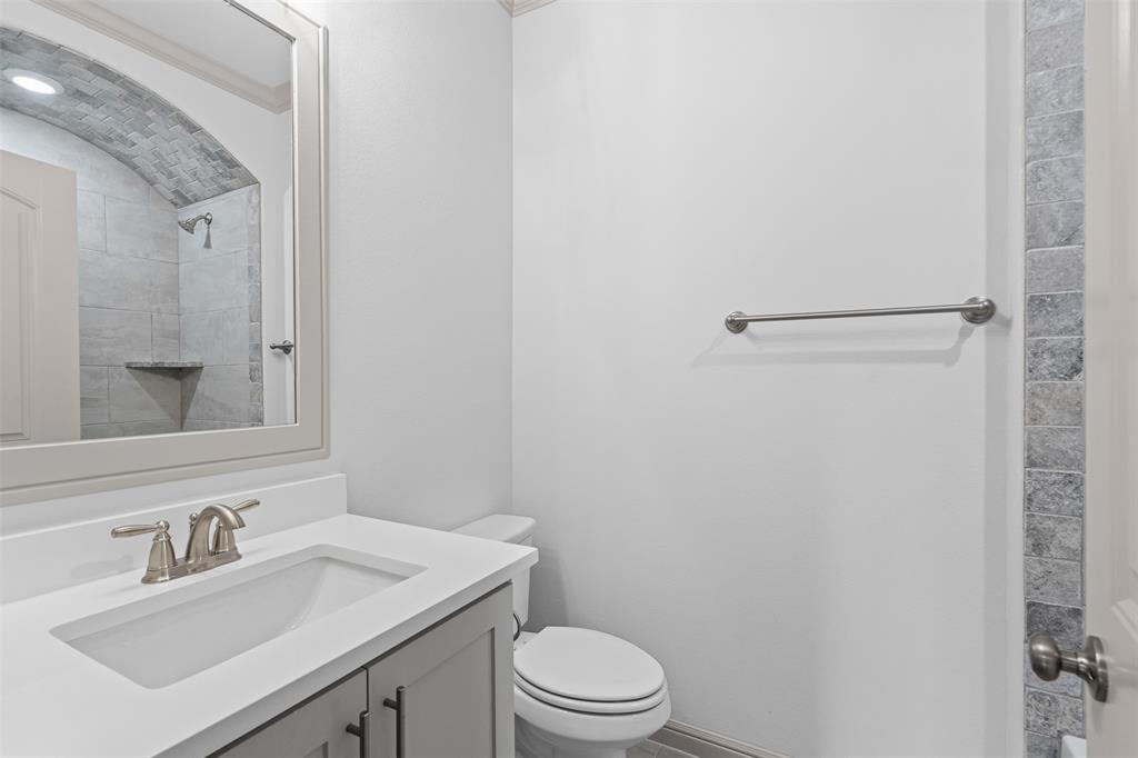 725 Jameson Springtown, TX 76082 - Photo 26 of 38 a bathroom with a sink toilet and vanity