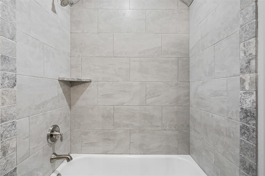 725 Jameson Springtown, TX 76082 - Photo 27 of 38 a bathroom with a shower