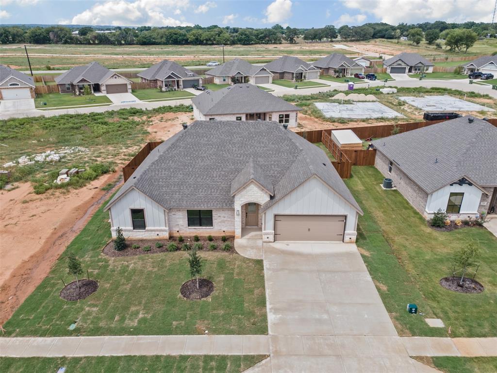 725 Jameson Springtown, TX 76082 - Photo 33 of 38 an aerial view of a house with garden and lake view