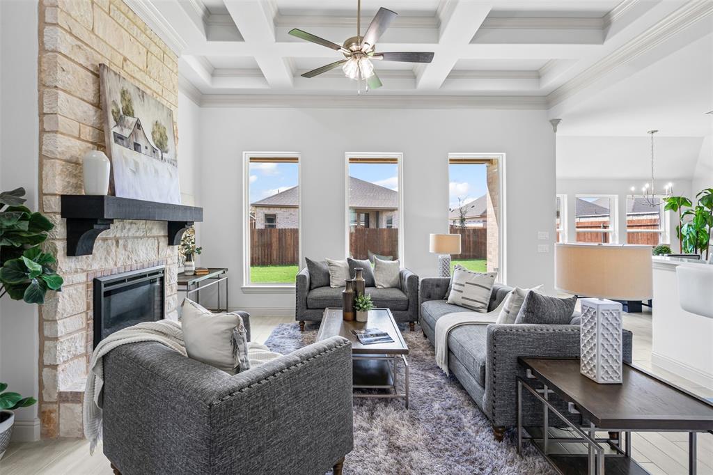 725 Jameson Springtown, TX 76082 - Photo 6 of 38 a living room with fireplace furniture and a fireplace