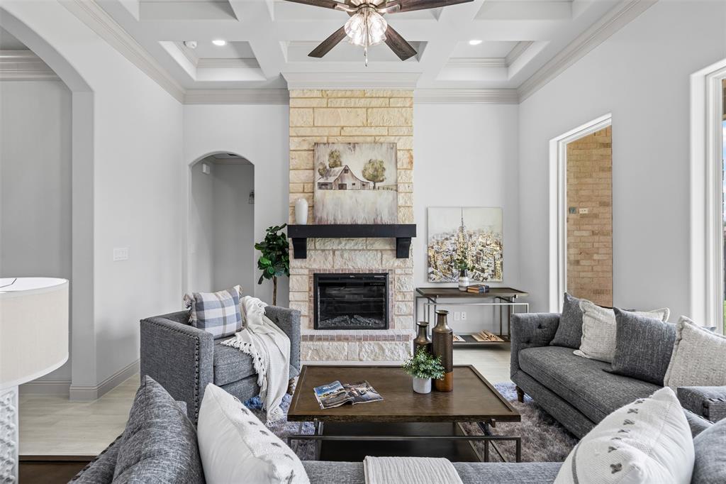 725 Jameson Springtown, TX 76082 - Photo 9 of 38 a living room with furniture and a fireplace
