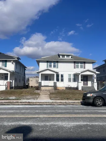 a view of a car park in front of a building