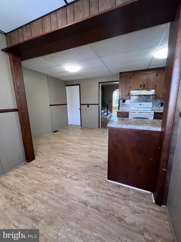 a view of a kitchen with a sink