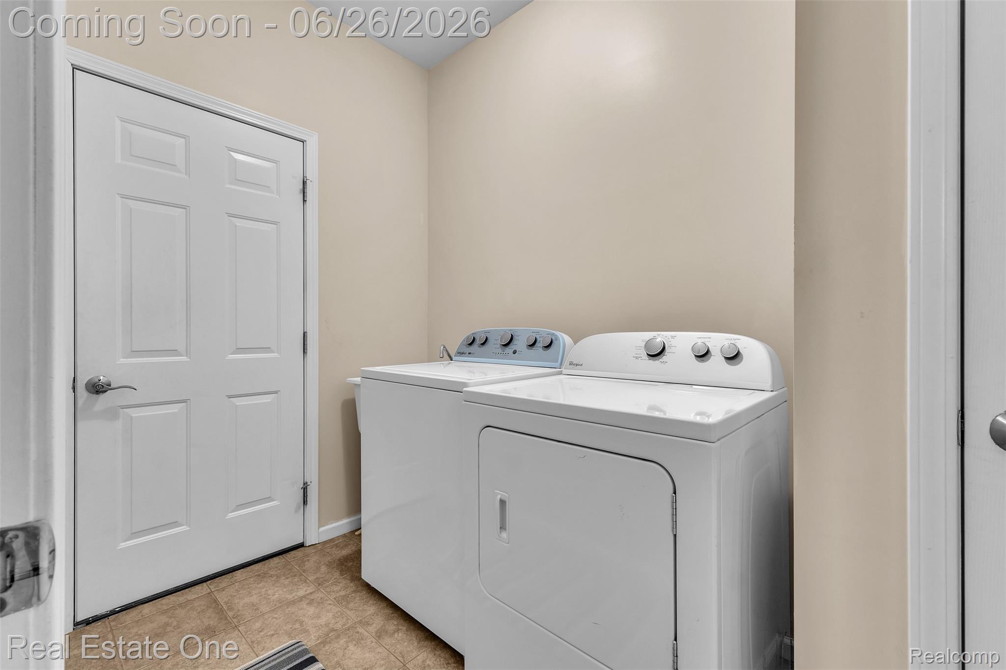 41590 Mitchell Road Novi, MI 48377 - Photo 21 of 45 Dedicated laundry area featuring ceramic tile flooring and light-toned walls