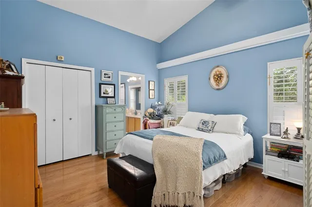 a bedroom with a bed and a cabinets