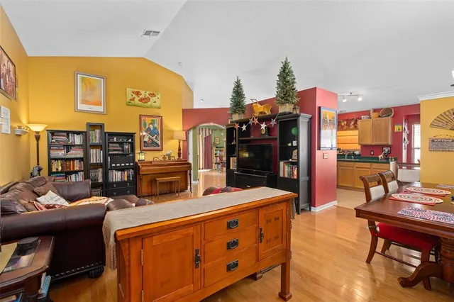a view of a living room and dining room