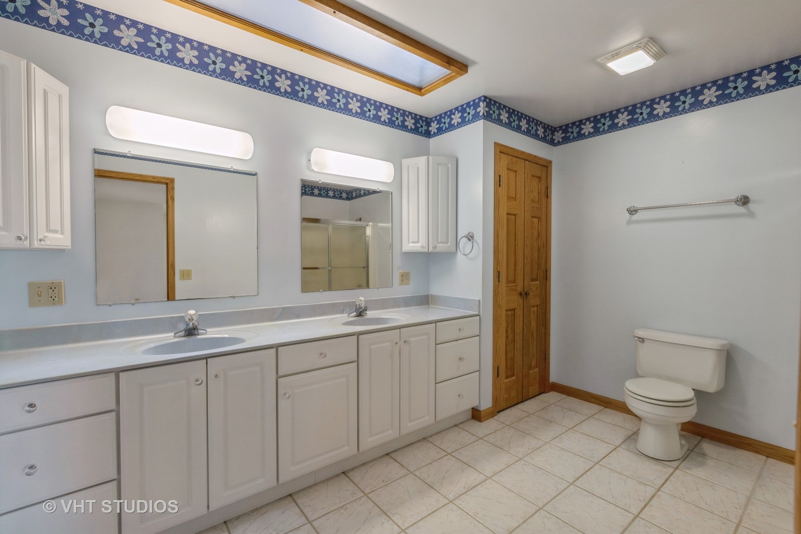 3440 Hermann Road Lee, IL 60530 - Photo 15 of 37 a spacious bathroom with a double vanity sink mirror and toilet