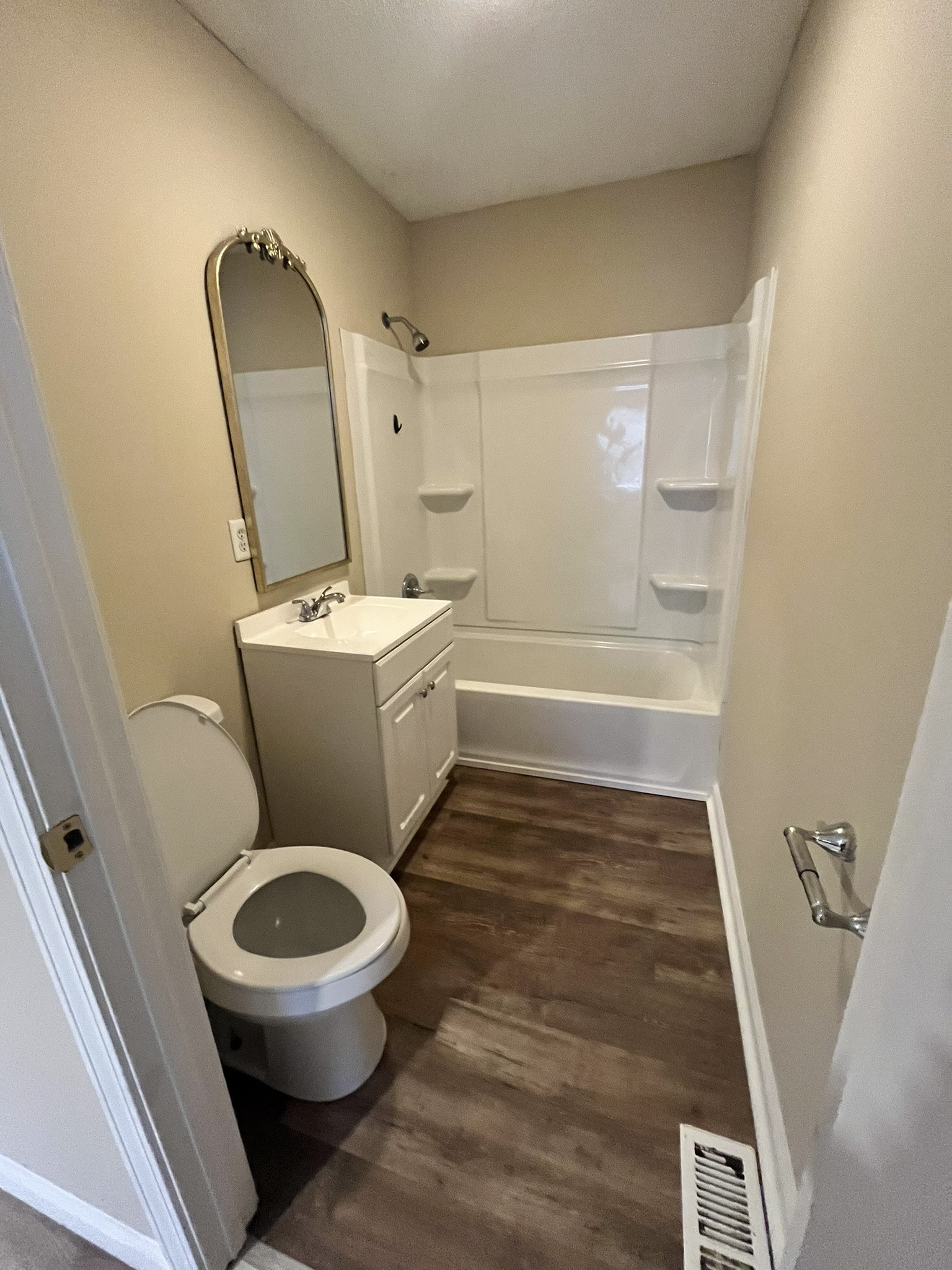 418 Woods Edge Road Winchester, TN 37398 - Photo 7 of 11 a white toilet sitting next to a bath tub