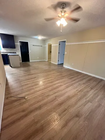 a view of a livingroom with a flat screen tv
