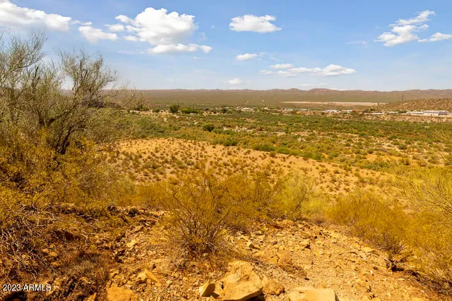 a view of a house with a street