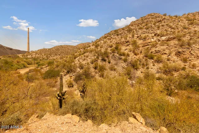 a view of mountain with sunset