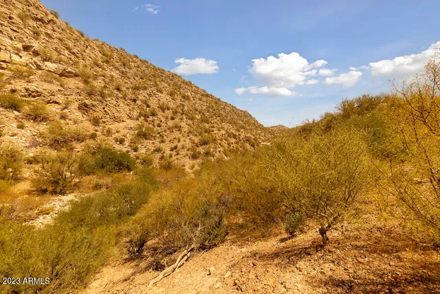 an aerial view of residential houses with ocean view