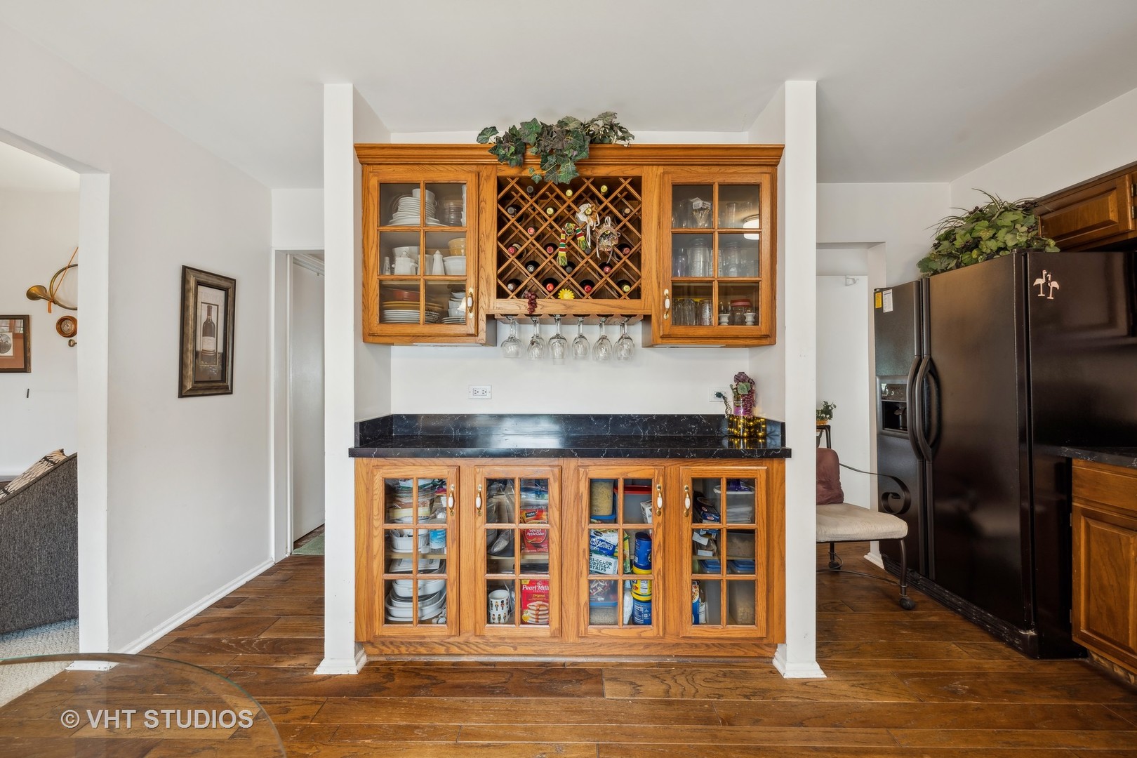 313 Ambleside Drive Roselle, IL 60172 - Photo 12 of 46 a open kitchen with stainless steel appliances granite countertop a refrigerator and a stove top oven