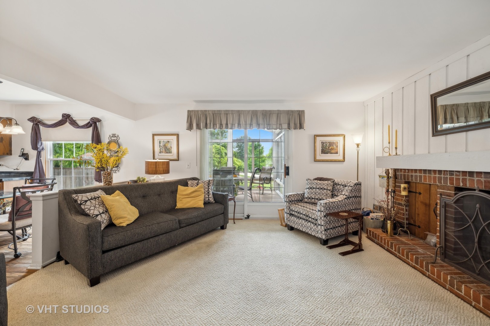 313 Ambleside Drive Roselle, IL 60172 - Photo 13 of 46 a living room with furniture and a fireplace