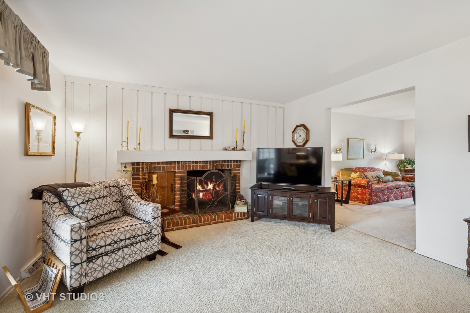 313 Ambleside Drive Roselle, IL 60172 - Photo 14 of 46 a living room with furniture and a fireplace