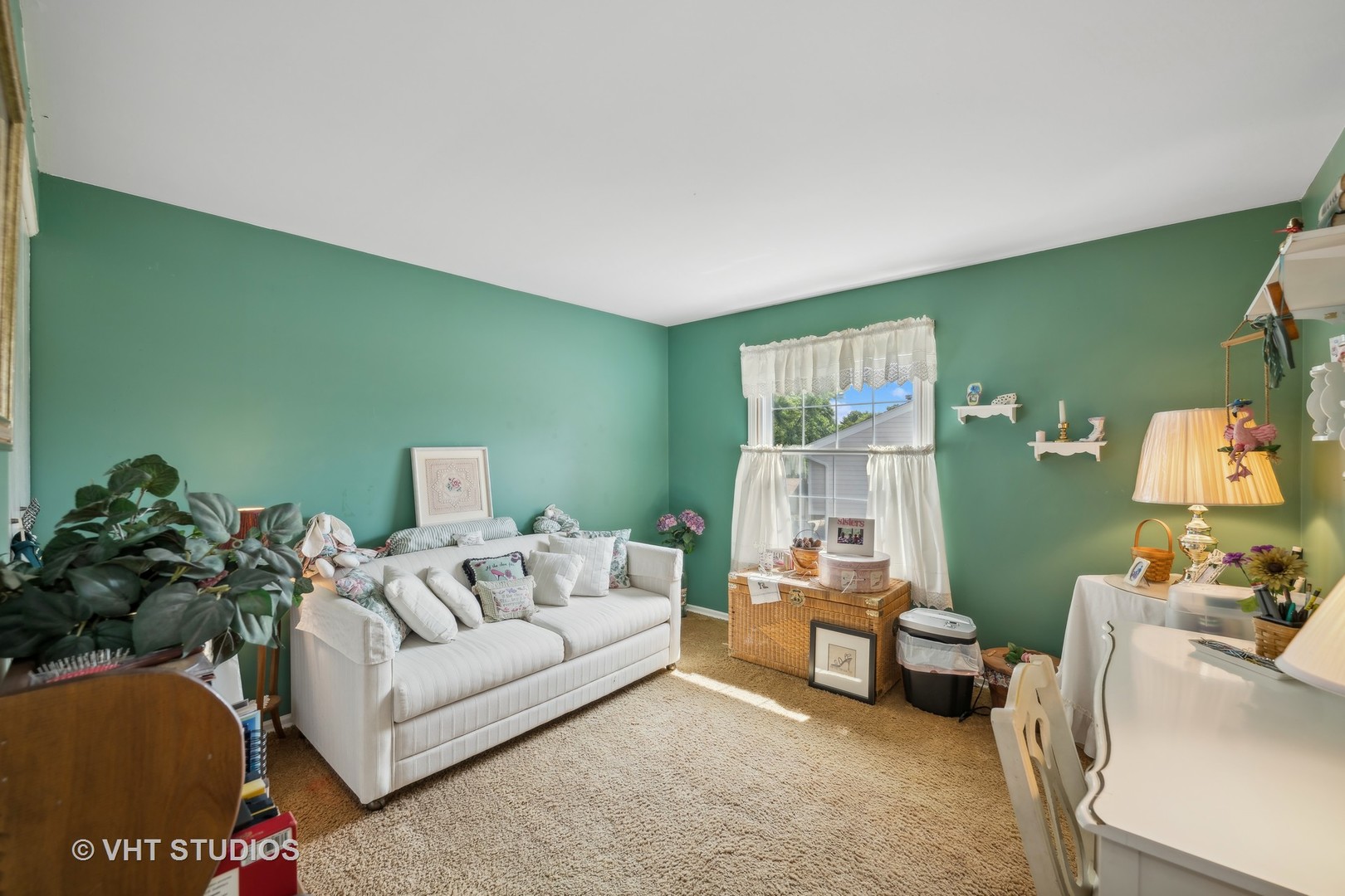313 Ambleside Drive Roselle, IL 60172 - Photo 17 of 46 a living room with furniture and a flat screen tv