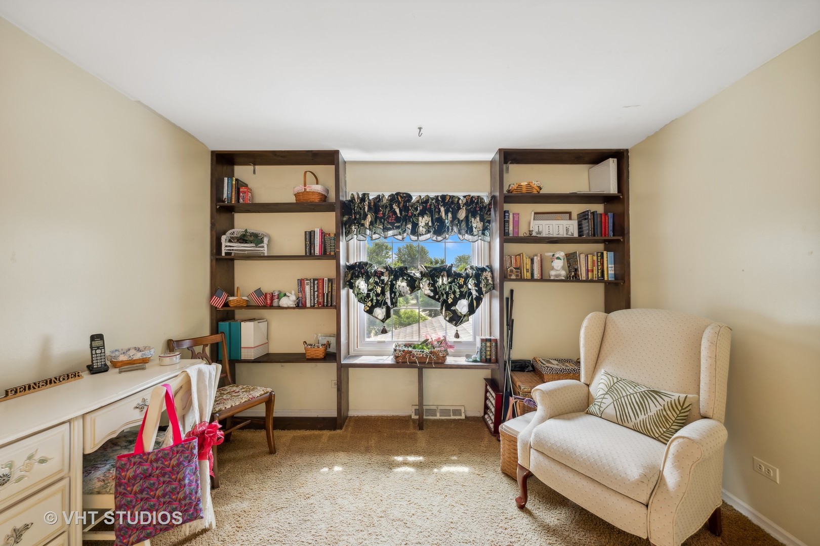 313 Ambleside Drive Roselle, IL 60172 - Photo 19 of 46 a living room with furniture cabinets and window