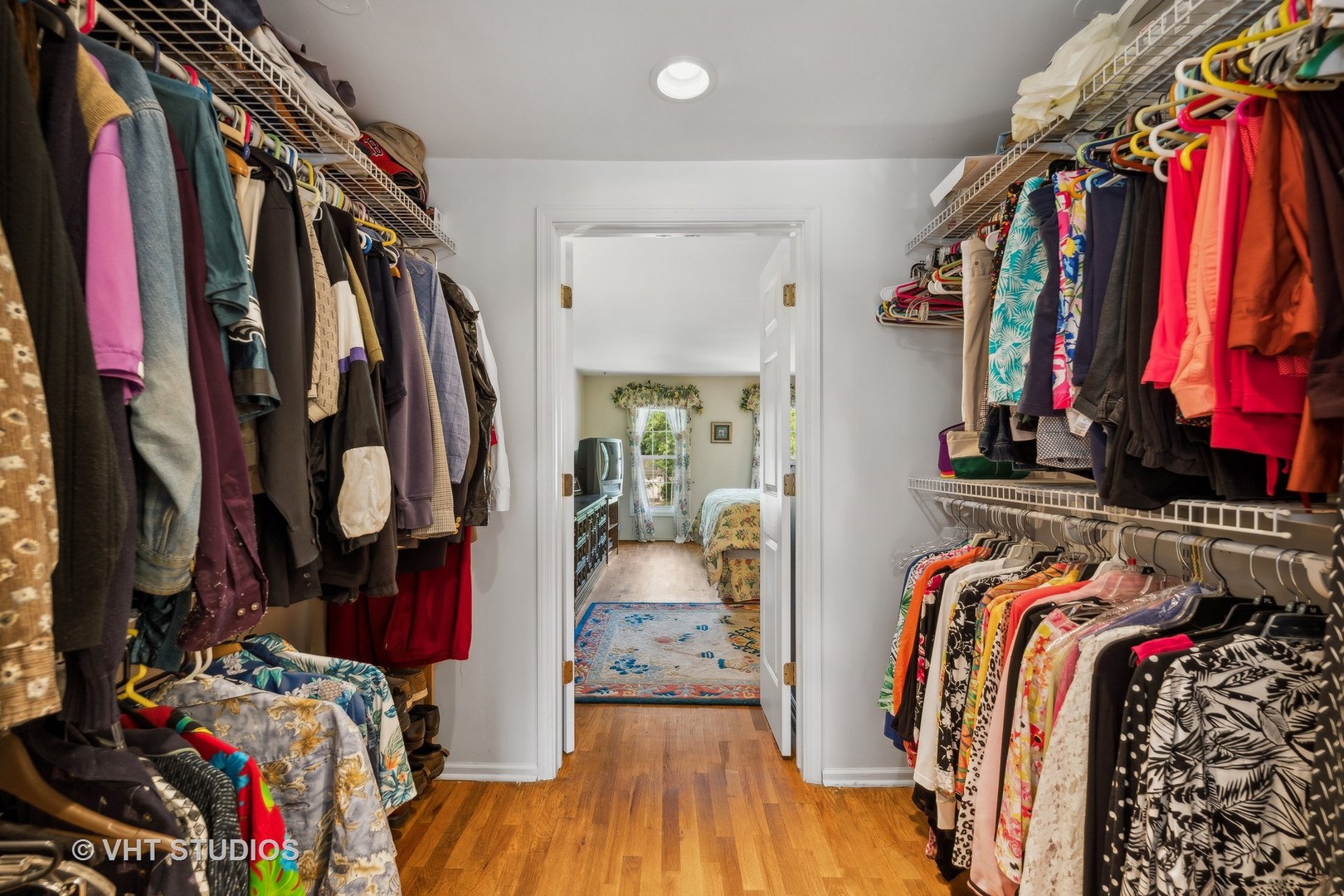 313 Ambleside Drive Roselle, IL 60172 - Photo 23 of 46 a view of walk in closet with clothes and shoes