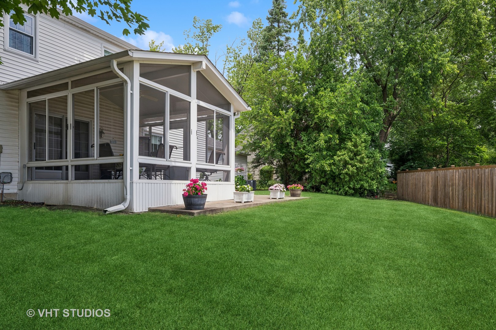 313 Ambleside Drive Roselle, IL 60172 - Photo 27 of 46 a view of a chair and table in backyard of the house