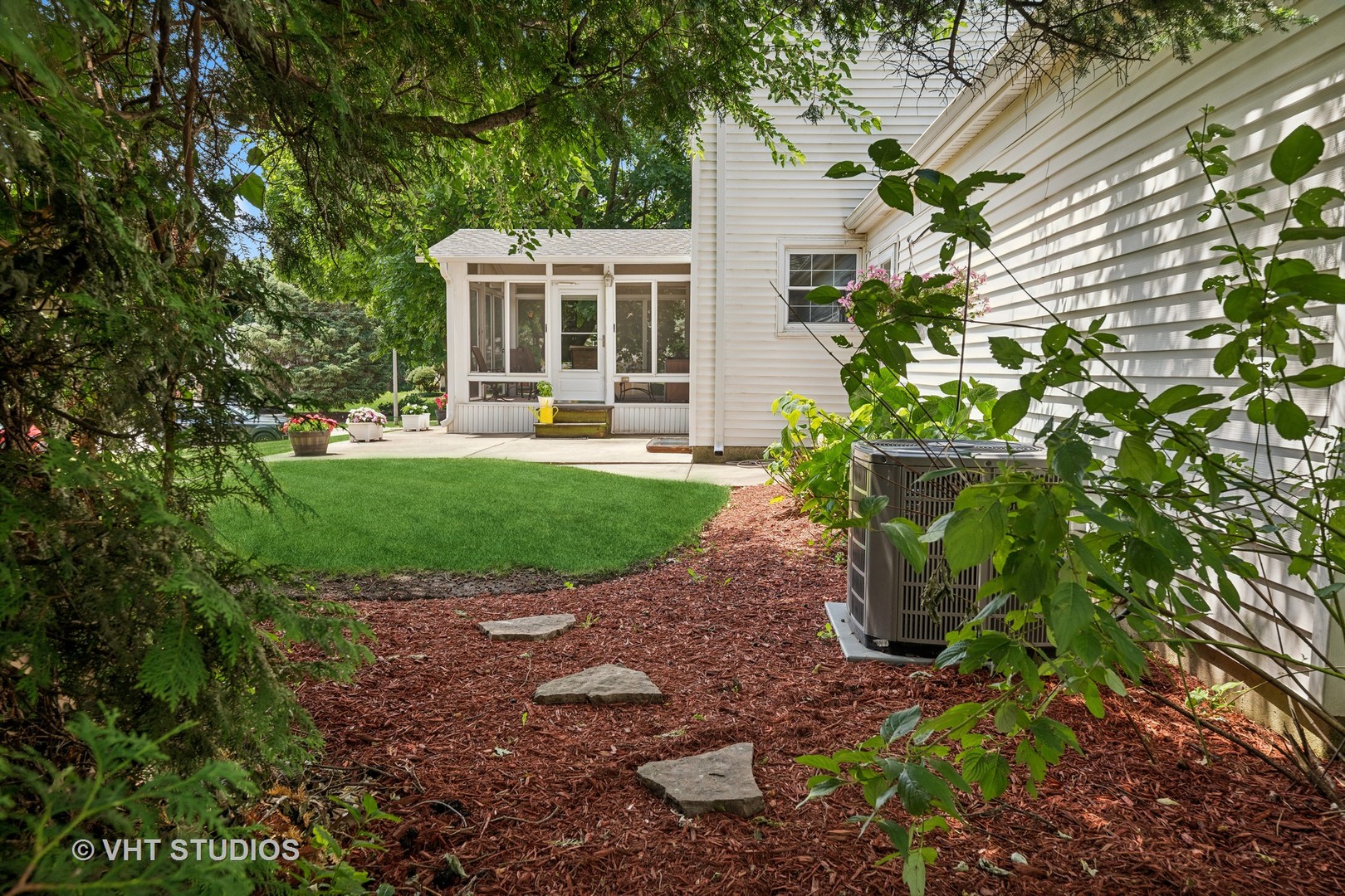 313 Ambleside Drive Roselle, IL 60172 - Photo 30 of 46 a view of a house with backyard and sitting area