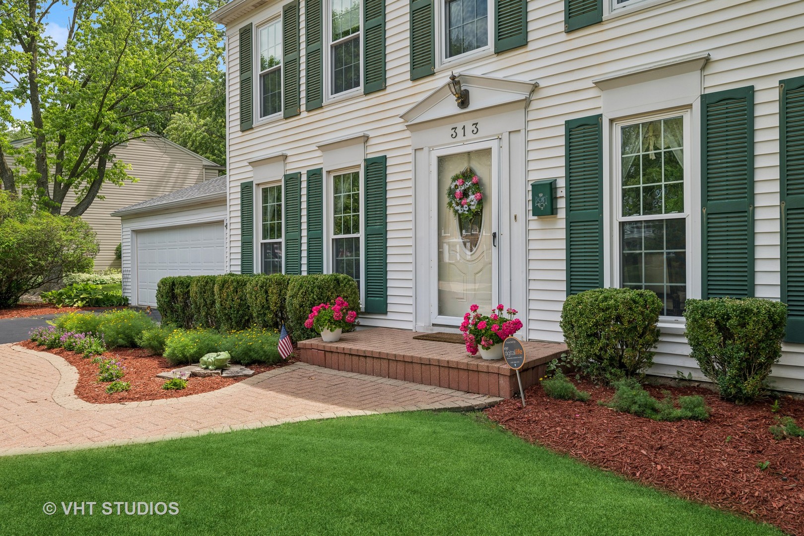313 Ambleside Drive Roselle, IL 60172 - Photo 4 of 46 a view of a house with a yard