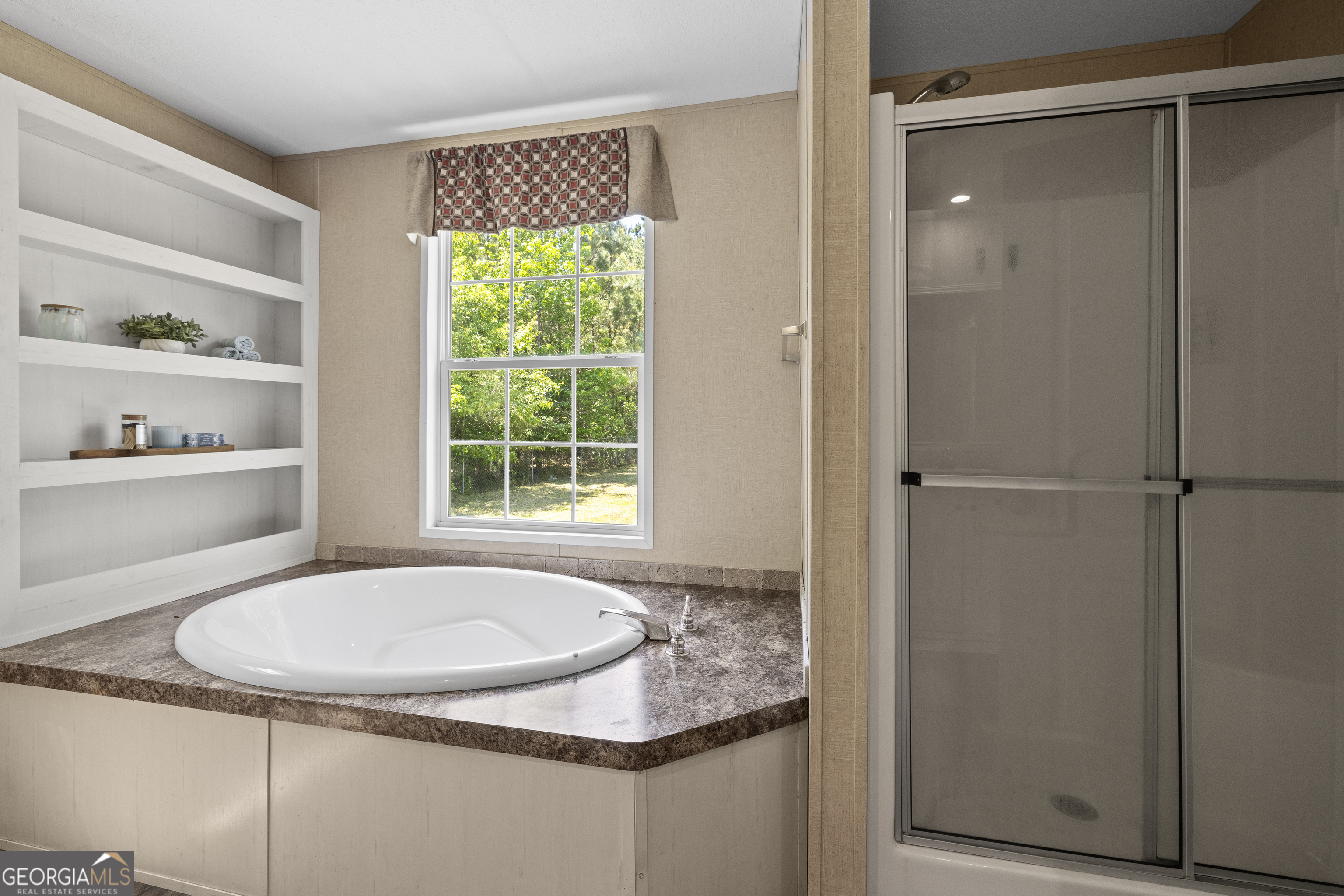 1173 Highway 21 Springfield, GA 31329 - Photo 12 of 18 a bathroom with a granite countertop sink and a mirror