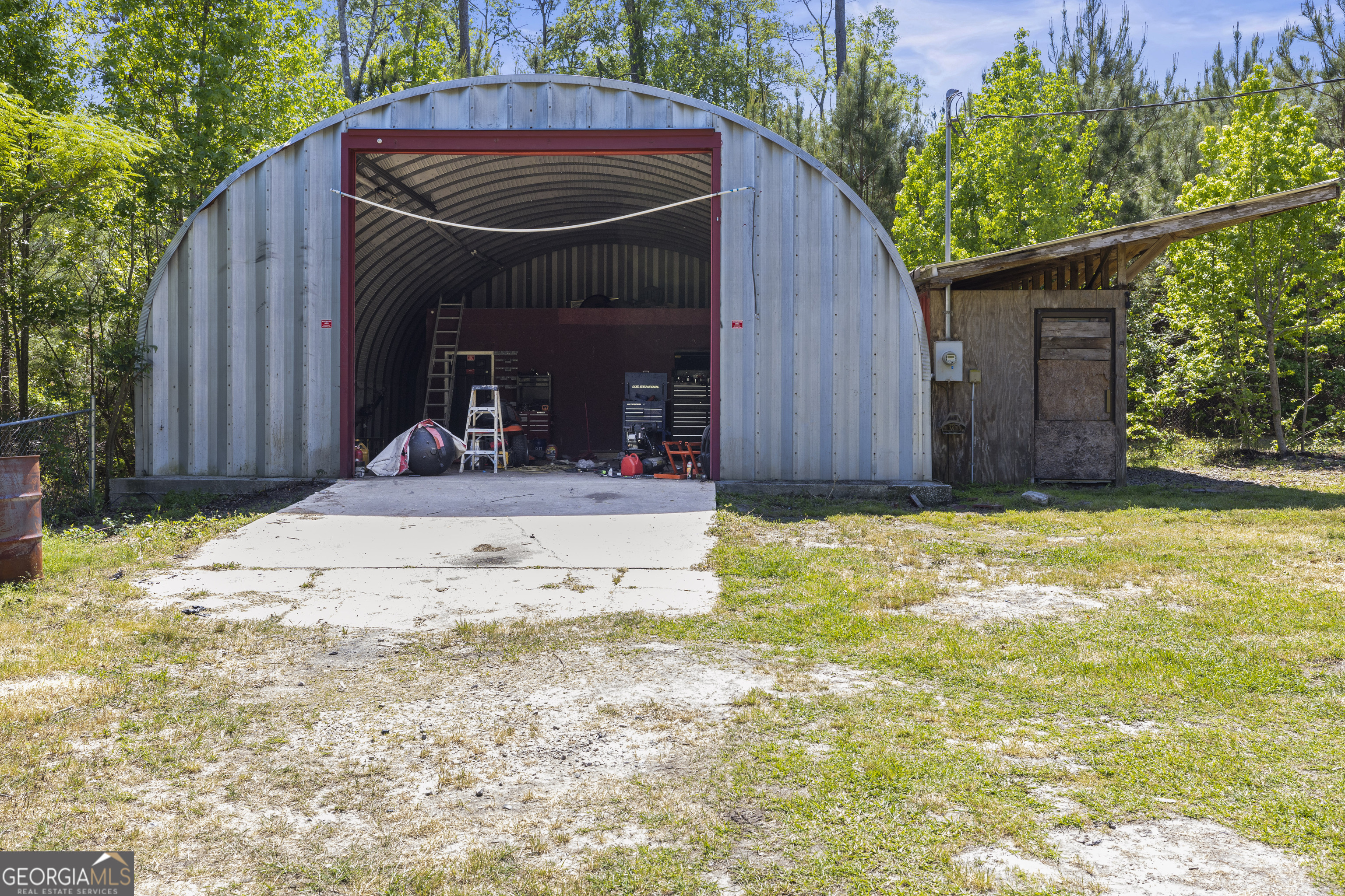 1173 Highway 21 Springfield, GA 31329 - Photo 18 of 18 a view of a house with backyard and sitting area